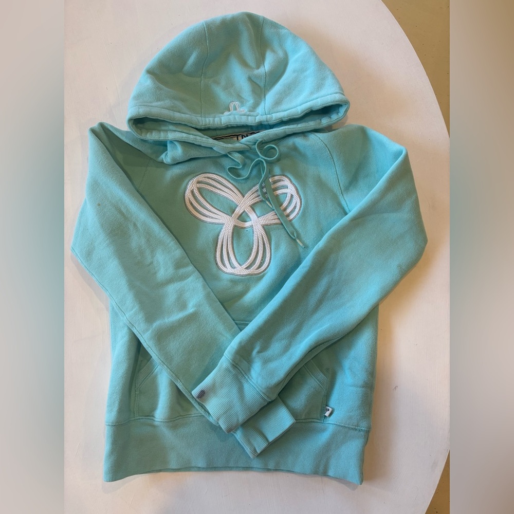 Light blue TNA Hoodie with White Logo